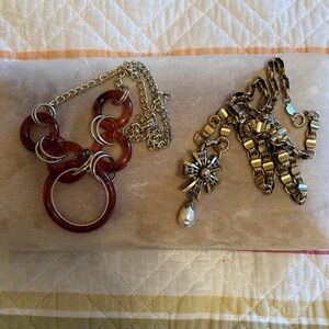 Vintage gold tone and tortoise necklaces.